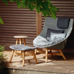 04.04.05_284x284_Dedon-MBrace-Teak-Sessel-Hocker-Mood.webp